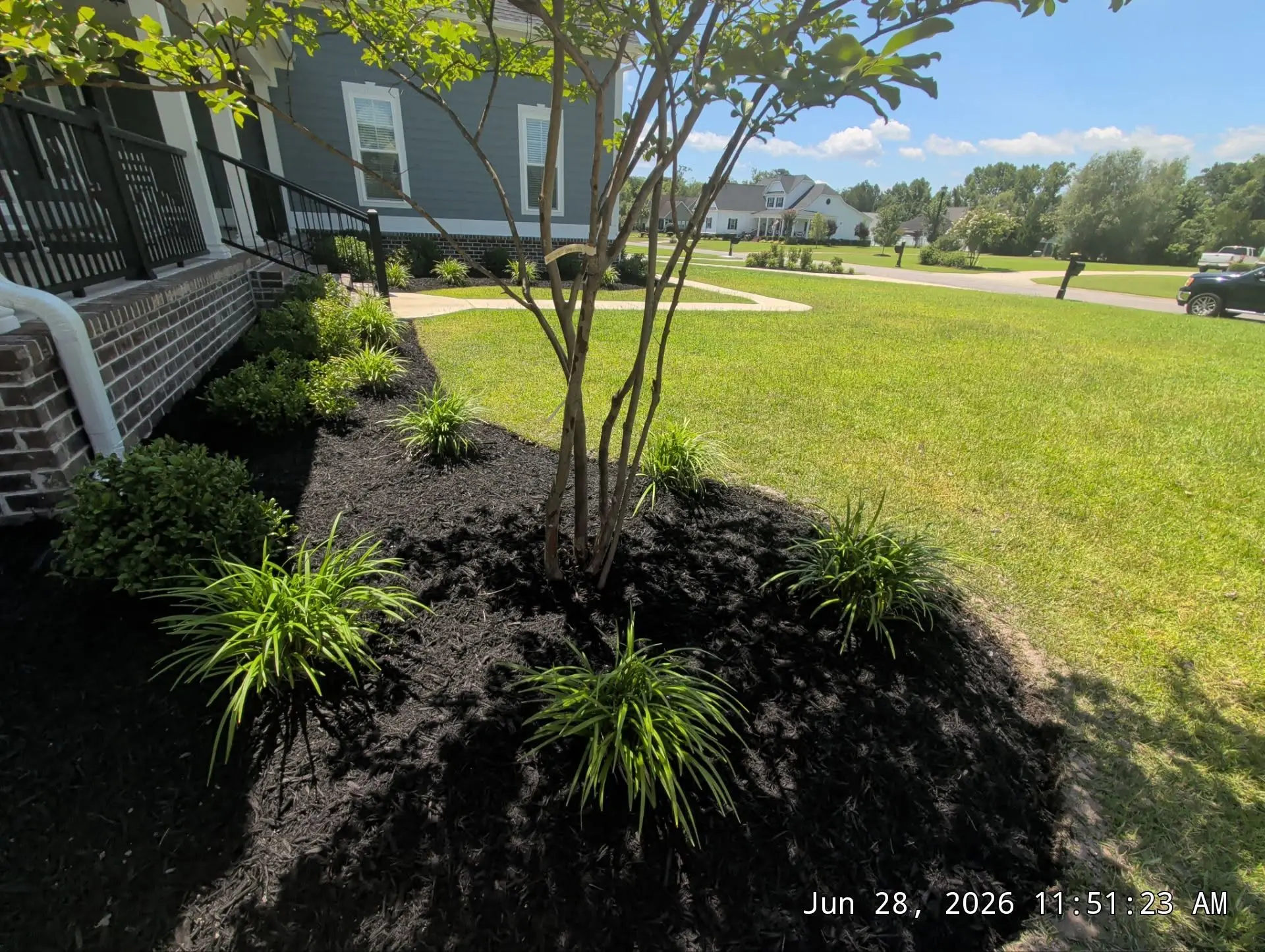 Freshly finished landscape bed completed by Mako Property Solutions